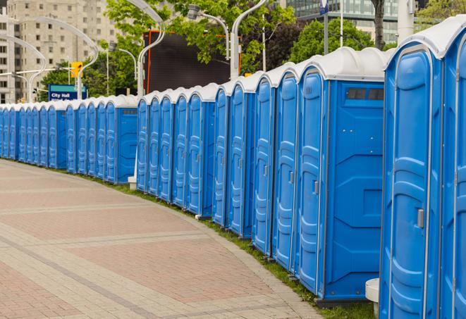 portable restrooms lined up at a marathon, ensuring runners can take a much-needed bathroom break in Conway